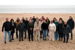 groepsfoto op het strand